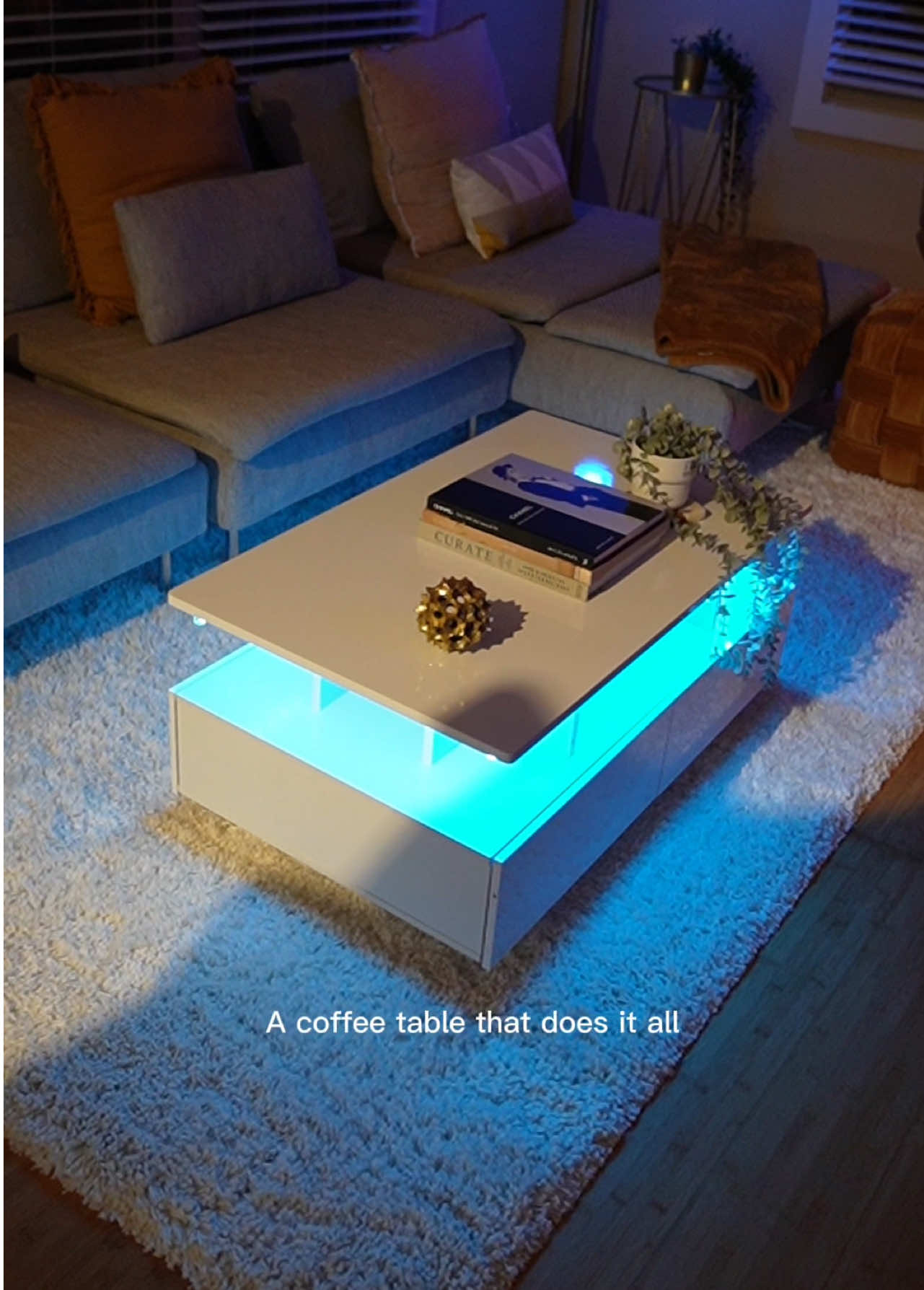 This coffee table is giving main character energy! LED lights, storage space, and a sleek glossy finish? It does not disappoint. It completely elevated my living room vibe. Definitely recommend for anyone wanting a modern upgrade. #TikTokShopFinds #HomeDecorInspo #LedCoffeeTable #ModernLivingRoom #TikTokMadeMeBuyIt #YITAHOME #SmallSpaceSolutions #FurnitureFinds #InteriorGoals #HomeGlowUp