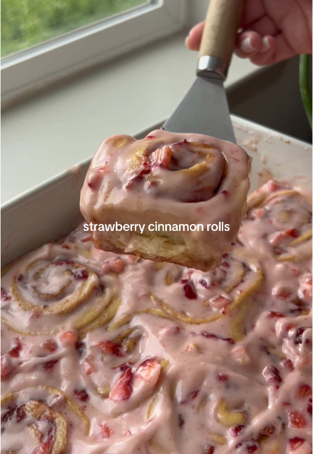 Strawberry Cinnamon Rolls🍓 Ingredients for the dough: • 3/4 cup warm milk (heat for 45 seconds)  • 1 packet instant yeast  • 1/4 cup melted butter  • 1 egg • 1 egg yolk  • 1/4 cup sugar • 1/4 tsp salt • 3 cups bread flour  Directions: 1. Whisk the warm milk, active yeast, butter, eggs, and sugar until combined.  2. Add in the salt and bread, mix until just combined. Knead the dough for about 5-8 minutes or until the dough bounces back when pressed on.  3. Place the dough in an oiled bowl and cover with plastic wrap or a towel. Let rise for 1.5-2 hours.  Ingredients for the filling: • 1/4 cup softened butter • 2/3 cup brown sugar • 1 1/2 tbsps cinnamon • 1/2 cup diced strawberries Directions: 1. Once the dough is done rising, punch the dough to release all of the air. Then place it on a well floured surface. 2. Roll out the dough into a square or rectangle shape. Spread the softened butter all over the dough. 3. Mix the cinnamon and brown sugar. Sprinkle all over the butter and then press dough to compact it.  4. Sprinkle the strawberries all over the dough.  5. Starting with the smaller side, tightly roll the dough all the way to the other end until it’s in a log shape. Then using a bread knife or floss, cut the dough into 12 rolls, placing them cut side down in an oiled 9x13 pan.  6. Cover the rolls with plastic wrap or a towel and let rise for 45 minutes. 7. Bake at 350 degrees for about 20 minutes or until golden brown. Let cool slightly.  Ingredients for the Strawberry Cream Cheese Frosting: • 4oz cream cheese (softened) • 3 tbsps butter (softened) • 3/4 cup powdered sugar  • 1 tsp vanilla extract • 1 tbsp strawberry syrup (optional) • 1/4 cup diced strawberries Directions: 1. Beat the cream cheese and butter. Then add in the vanilla, powdered sugar, and strawberry syrup beating until combined. Lastly stir in the strawberries. 2. Spread the icing onto the slightly warm rolls. Serve and enjoy!  #cinnamonrolls #baking #EasyRecipes #dessert #sweetdeats #Recipe #recipeoftheday #breakfastideas #breakfast #strawberry #strawberryrecipes #Summer #summerrecipes #recipeshare #healthylifestyle #springrecipes 