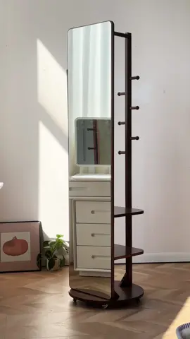 This full-length mirror has changed my space! 🪞✨ 360° rotation, solid wood frame, and built-in storage with clothes rack and shelves? Yes, please! Plus, it’s on wheels so I can move it wherever I need. #dressingmirror #fullengthmirror #homedecor #furniture #shopvideocarnival #solidwood #springtok #tiktokshopspringglowup #cozyhome #mirrorlove