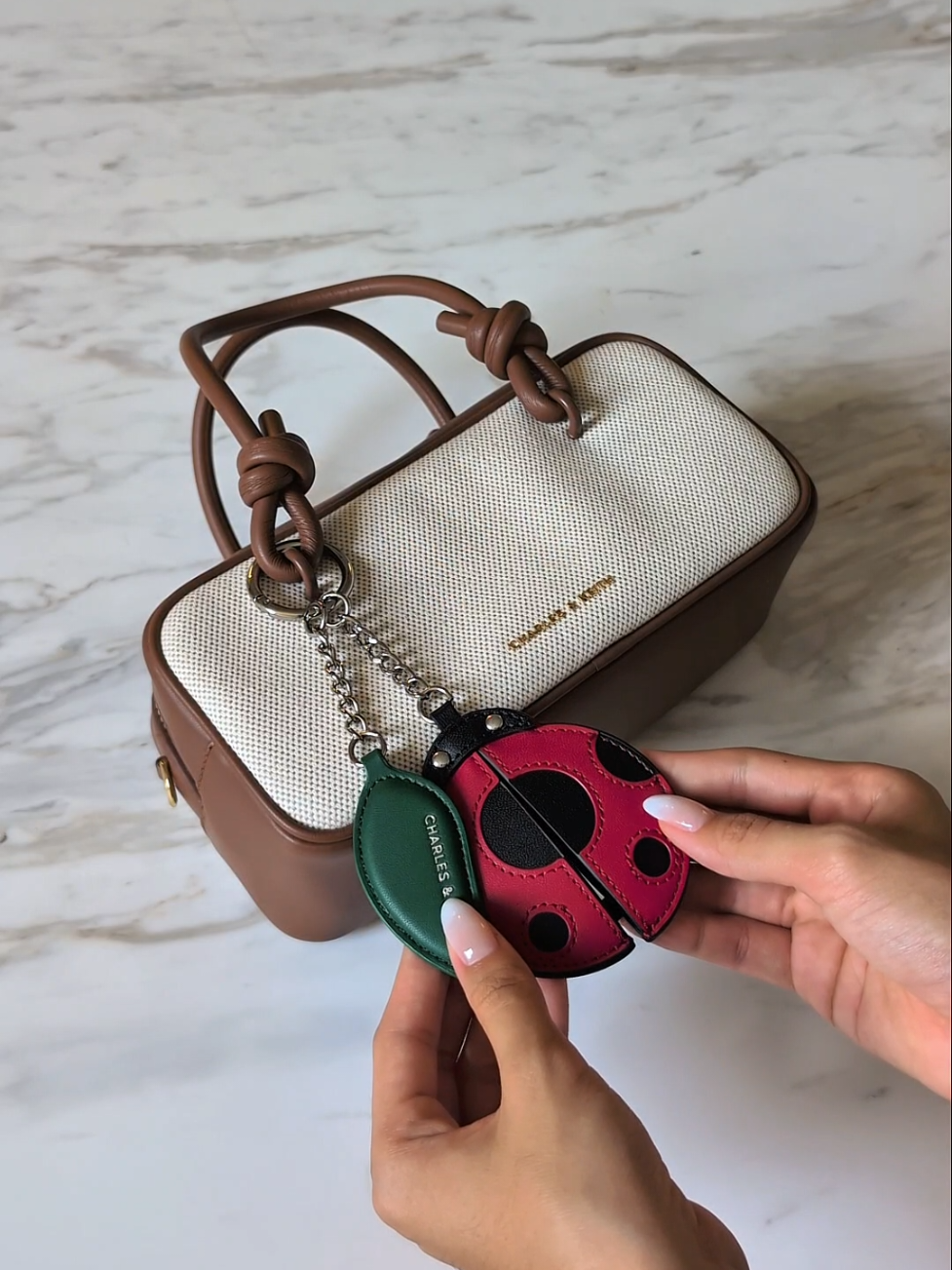 Ready for summer! ☀️ . Shop now via the link in bio  . Product featured:  Sammie Canvas Knotted-Handle Elongated Bag  #TikTokFashion #fashiontiktok #fyp #summerbag #shoulderbag 