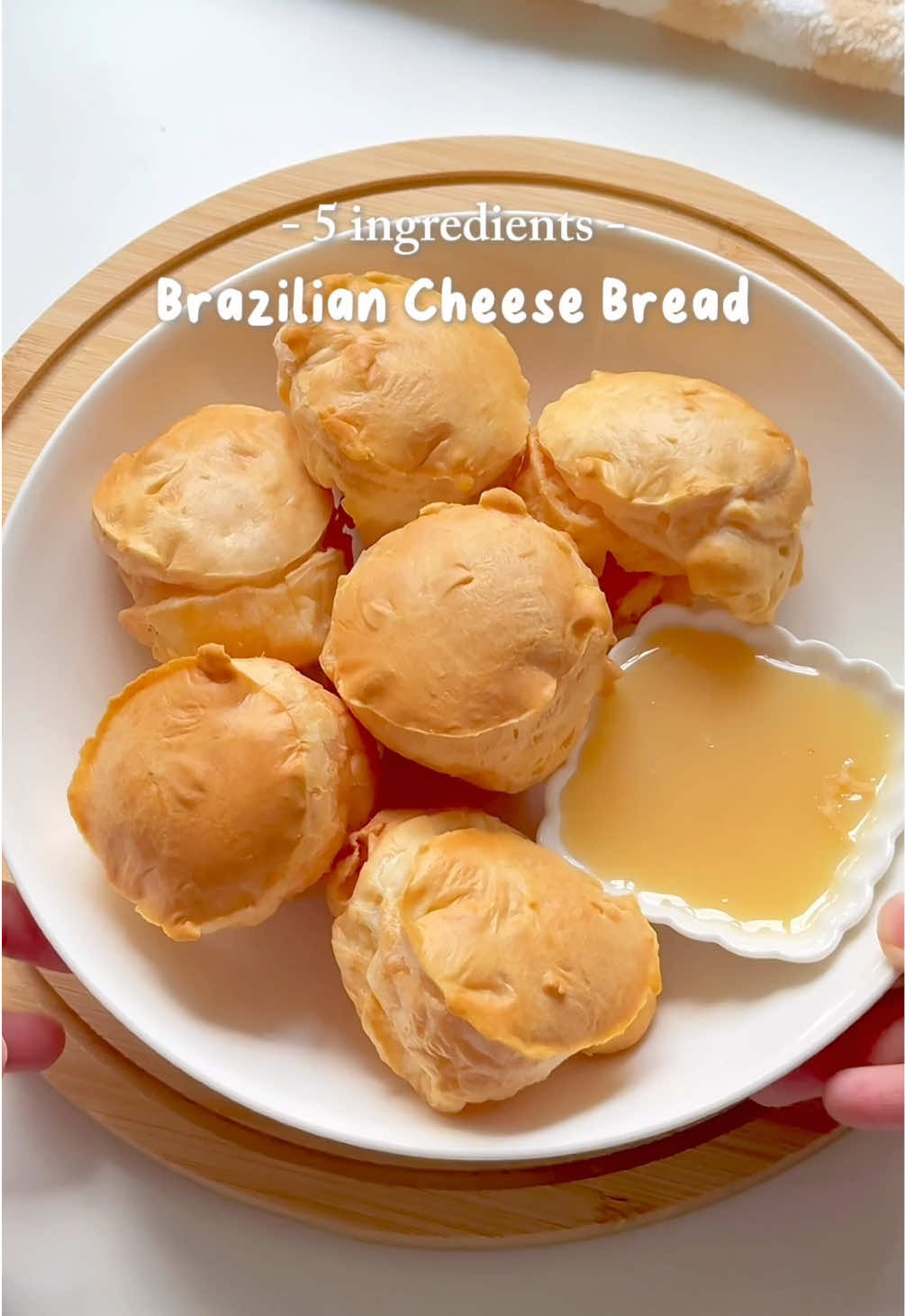 One of the easiest snacks I've ever made! With only 5 ingredients you can make this crunchy and chewy Brazilian cheese bread!  *highly recommend to dip with condensed milk 🤭 Ingredients: 1. 1 large egg 2. 180g tapioca starch 3. 150ml fresh milk 4. 50ml OKI canola oil 5. 100g Mozzarella Cheese (I'm using 50g OKI mozzarella cheese with 50g OKI cheddar cheese) @OKI.Malaysia 