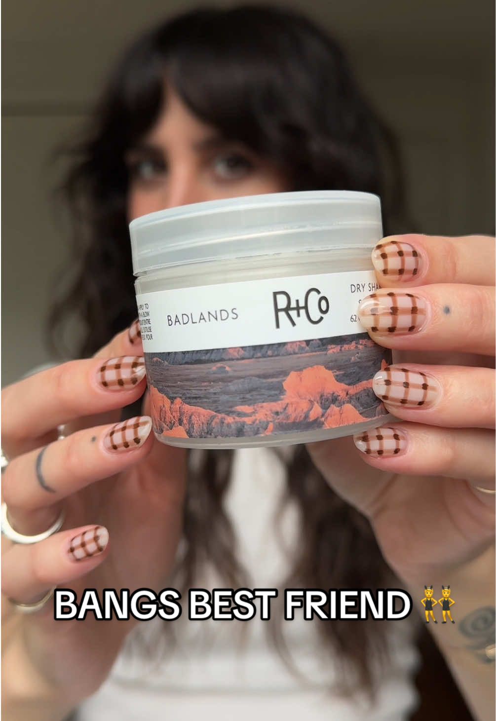 Growing out your bangs? Try this hack 💁‍♀️ BADLANDS Dry Shampoo Paste helps shape and hold bangs in place while adding volume + texture. #randco #hairtok #dryshampoo #bangstutorial #bangs #hairrefresh #veganhaircare #BestHairProducts 