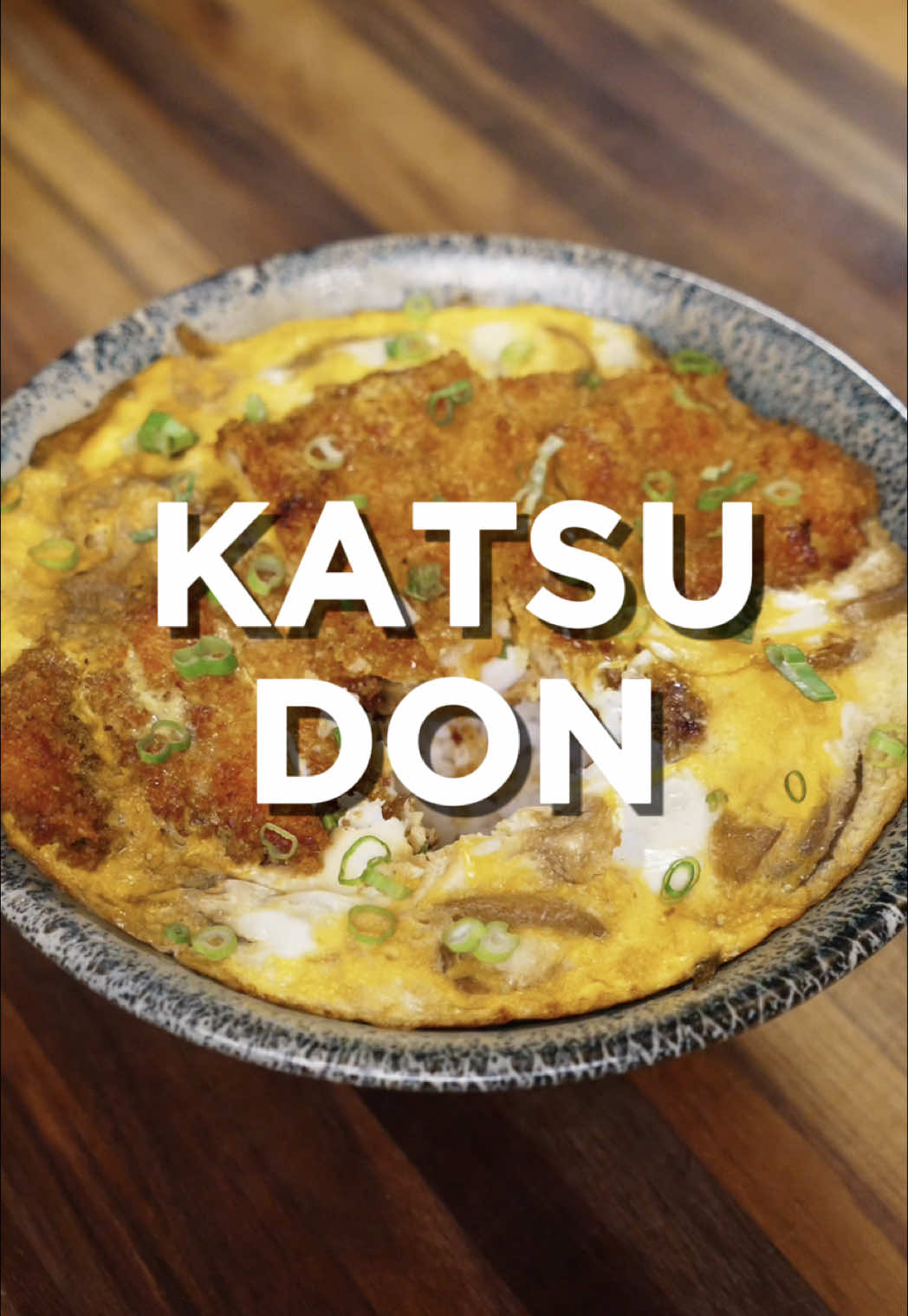 Katsu Don is one of those foods that always reminds you of home :)  Ingredients 2 thin chicken breasts Salt and pepper to taste ¼ cup flour 1 egg, beaten ½ cup panko breadcrumbs ½ onion, thinly sliced 2 eggs + 2 egg yolks (lightly beaten separately) ½ cup dashi broth 1 tbsp soy sauce 1 tbsp mirin 1 tsp sake 1 tsp sugar 1½ cups cooked rice Optional: scallions Instructions 	1.	Season chicken breasts with salt and pepper. 	2.	Dredge in flour, then egg, then panko. 	3.	Fry in oil at 350°F (175°C) for about 4 minutes per side, until golden brown. 	4.	While resting, thinly slice onion and beat the eggs and yolks. 	5.	In a pan, combine dashi, soy sauce, mirin, sake, and sugar. Simmer. 	6.	Add onions and cook until wilted. Add sliced katsu, then pour eggs over and cover until eggs are just set. 	7.	Serve over rice, garnish with scallions if desired. #fyp #meals #food #cooking #EasyRecipe #Recipe #asianrecipes #dinner #recipes #cheap #friedchicken 