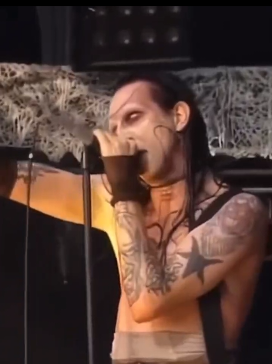 🎤✨ MANSON 1997: THE NIGHT HE UNLEASHED HELL 🔥🕷️ They *weren’t ready* for what hit that stage... ⚠️ Rare footage from 1997.   🕸️ Marilyn Manson performing *