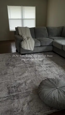 POV: You found the perfect 8x10 rug on the ttshop.  Y’all it literally is perfect and the rug has really helped to elevate my space. It is washable and seemingly easy to easy. It is not that thick which I don’t mind rn. I really love this rug y’all!!   #rug #8x10rug #rugtok #livingroomdecor #livingroomrug 