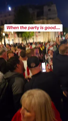 Filming the party in Trafalgar Square on Friday night and pan down to find Jodi scranning the chip and dip! Still dancing though! #fyp #chipanddip #mands #mexicanstylelayereddip #sunderland #tilltheend #playoff #wembley #trafalgarsquare #safc #wife #couple 