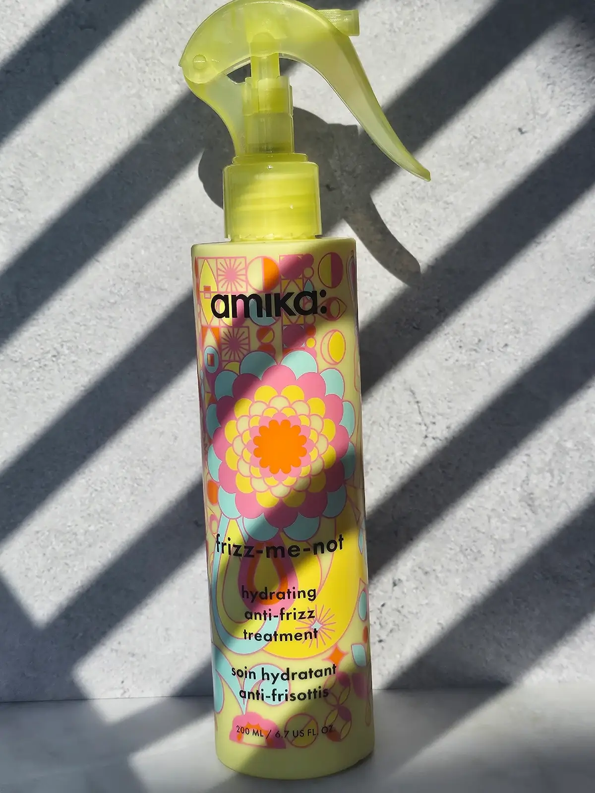 @amika  treats my hair better than I treat my plants.. at least something in my life is thriving. #GiftedbyAmika  Their newest launch, the Frizz-Me-Not Hydrating Anti-Frizz Treatment, is basically a miracle for frizzy, dry hair. It’s a 2-in-1 leave-in and smoothing spray that seals in moisture for up to 72 hours, protects against heat (up to 450°F), and leaves your hair feeling soft, smooth, and super glossy. It works best for wavy to curly hair, especially if you’ve got medium to thick texture. Plus, it’s heat activated, so you look like you just came from the salon with a blowout.  The scent is a mix of fresh citrus, sweet clover with a little spice, and warm vanilla. Honestly, it smells as good as your hair’s about to look. Thank you to Skeeprs and Amika for gifting me this.  #amika #amikahairproducts #amikahair #frizzmenot #amikafrizztreatment #frizzyhair #frizzyhairtips #dryhair #hairtok #haircare #dryhairtreatment #gifted #blowouts #leaveintreatment #hairtreatment #heatprotectant #haircareroutine 