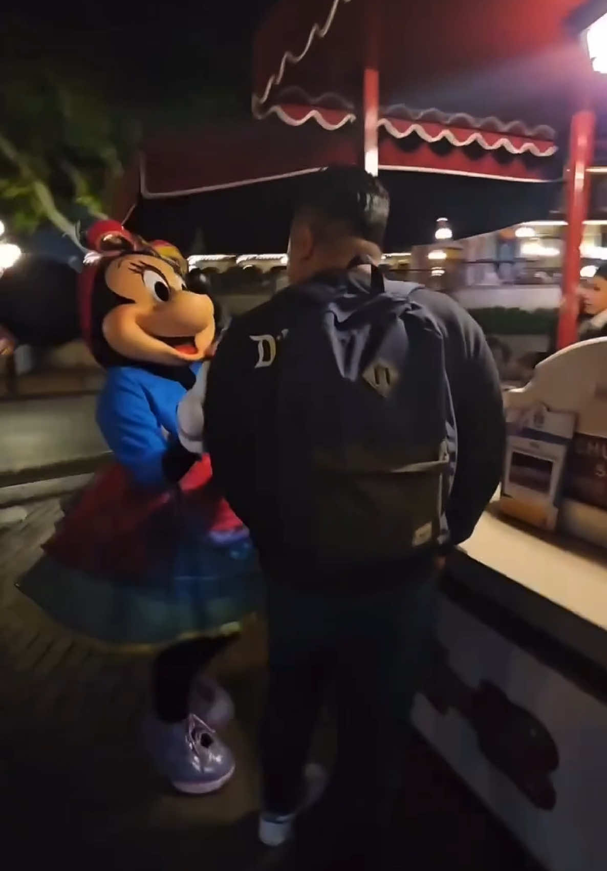 1. Disneyland has a celebration churro that has Ube Sugar 2. I had no idea what was going on in line behind me. Minnie just appeared next to me and I was confused. 3. Minnie didn’t want the churro. 😝 🎥 @jazzytig21  #disneyland #disney #minniemouse #pluto #dkababayan