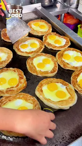 Roti Sarang Burung 📍Malaysia 🇲🇾 Explore Malaysia: https://www.tasteatlas.com/malaysia Roti Sarang Burung is a popular Malaysian street food, known for its simple yet satisfying combination of textures. A slice of bread is pan-fried with a cracked egg in the center, resembling a bird’s nest. Often topped with mayonnaise, cheese, sausage, or chili sauce, it’s a quick, affordable, and flavorful breakfast or snack enjoyed across Malaysia. Video: @bestfoodmalaysia