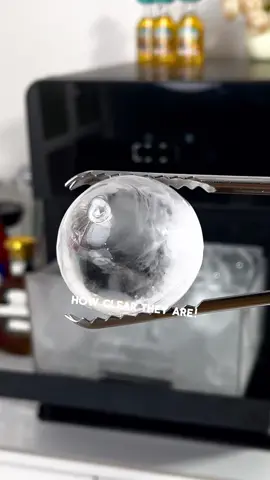 CLEAR ICE BALL MAKER🥃#ice #iceball #clearice #wiskey #drink #icemaker #fyp #cocktails #ecozy #icecube 