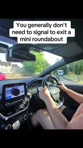 You don’t need to signal to exit a mini roundabout, generally the position of your car will be your signal. #learntodrive #passyourtest #passmytest #drivinglessons #drivingtestsuccess #drivingtesttips #fyp #miniroundabouts #roundabouts 