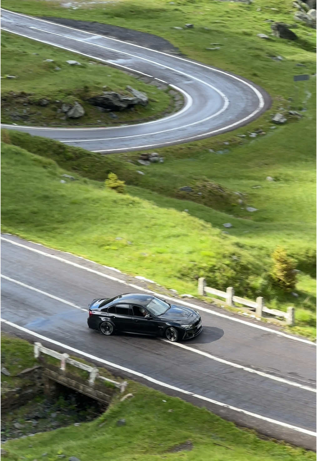 Do you like driving? Not the daily commute or the Sunday cruise. I mean driving—the kind that makes your palms sweat on the wheel and your soul hum through the chassis. The Transfăgărășan isn’t a road you take—it takes you. Hairpins so tight they feel like God’s own paperclips, drops so sheer your stomach forgets itself, and straightaways that beg you to flirt with the redline. It’s not built for the passive. It’s for the driver who downshifts before the apex and smiles into the bend like it’s a punch he saw coming. They call it the best road in the world—and not quietly. Top Gear made it famous, but those of us who breathe petrol and brake fluid knew before the cameras rolled. At 2,042 meters, it weaves like a fever dream through the Carpathians, flanked by stone, shadow, and silence. There’s no rhythm here, only raw improv: throttle, brake, curse, laugh, repeat. It’s where grip becomes gospel and understeer feels like blasphemy. Forget Nürburgring. Forget Stelvio. The Transfăgărășan doesn’t compete—it reigns. You think you’ve driven great roads until this one rearranges your synapses. Until you touch the edge of control and keep it there, balanced like a coin on its side. The kind of drive that doesn’t end when you park—it lingers, humming in your bones days later. Is it the best road in the world? Maybe. Or maybe it’s just the one that understands what driving really means. What road made you feel like that? Video by @biskvit88  [ Transfagarasan Highway, Best Driving Roads, Car Enthusiasts, Hairpin Corners, Carpathian Driving, Romanian Mountains, Mountain Passes, Scenic Drives, Top Gear Romania, Petrolheads, Road Trip Goals, Performance Driving, Apex Hunting, High Altitude Roads, Twisties, Legendary Drives, Automotive Passion, Spirited Driving, Balea Lake, Driving Paradise ] #romania #travel #transfagarasan #driving