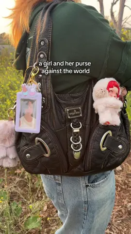 my @Angelkiss Bags purse with a bunch of cute bag charms on it is everythingggg 🤎