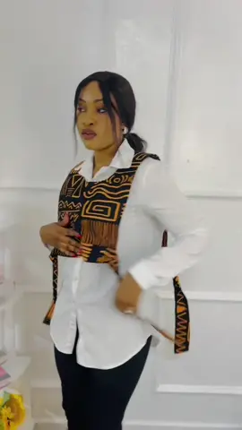 🌟🌟🌟Don’t wear a boring white shirt-style it with kitenge 🔥🔥 Kitenge top ONLY@1,300/- Free size dm to order and to see varieties. #fashion #ankara #Gieglamour #styletips #kitenge #african 