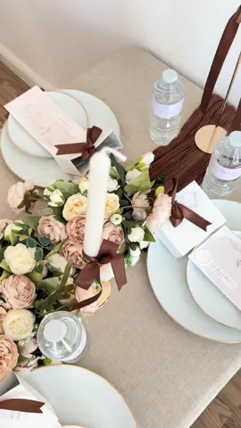 Timeless Touches ✨ THE NEUTRAL EDIT 🕊️🤎 A mix of linen, browns & beiges for the ultimate tablescaping experience! Menus & favour bags/boxes adding its touch to personalise your event specifically to you. This is our newest addition to the collection and it’s giving the perfect neutral vibe for any occasion.  DM on instagram for more information on our packages. #tablescape #fyp #tabledecor #decor #bespoke #tabledecoration #nuetralstyle #favours #wedding2025inspo #videoviral 