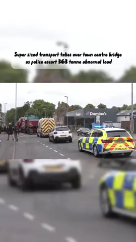 Super sized transport takes over town centre bridge as police escort 363 tonne abnormal load