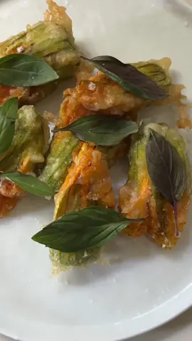 Stuffed Squash Blossoms filled with shrimp and ricotta with yuzu aioli.  No squash blossom is safe around me. If I see these at the farmers market they’re coming home. I adore a classic stuffed squash blossom but was craving a shrimp wonton so thought a squash blossom would be a perfect vehicle.  #homecooking #summerrecipes #cookwithme #squashblossom #Recipe #Foodie #homemade 