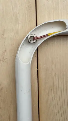 So simple yet effective – a smart idea for running a cable through a pipe.