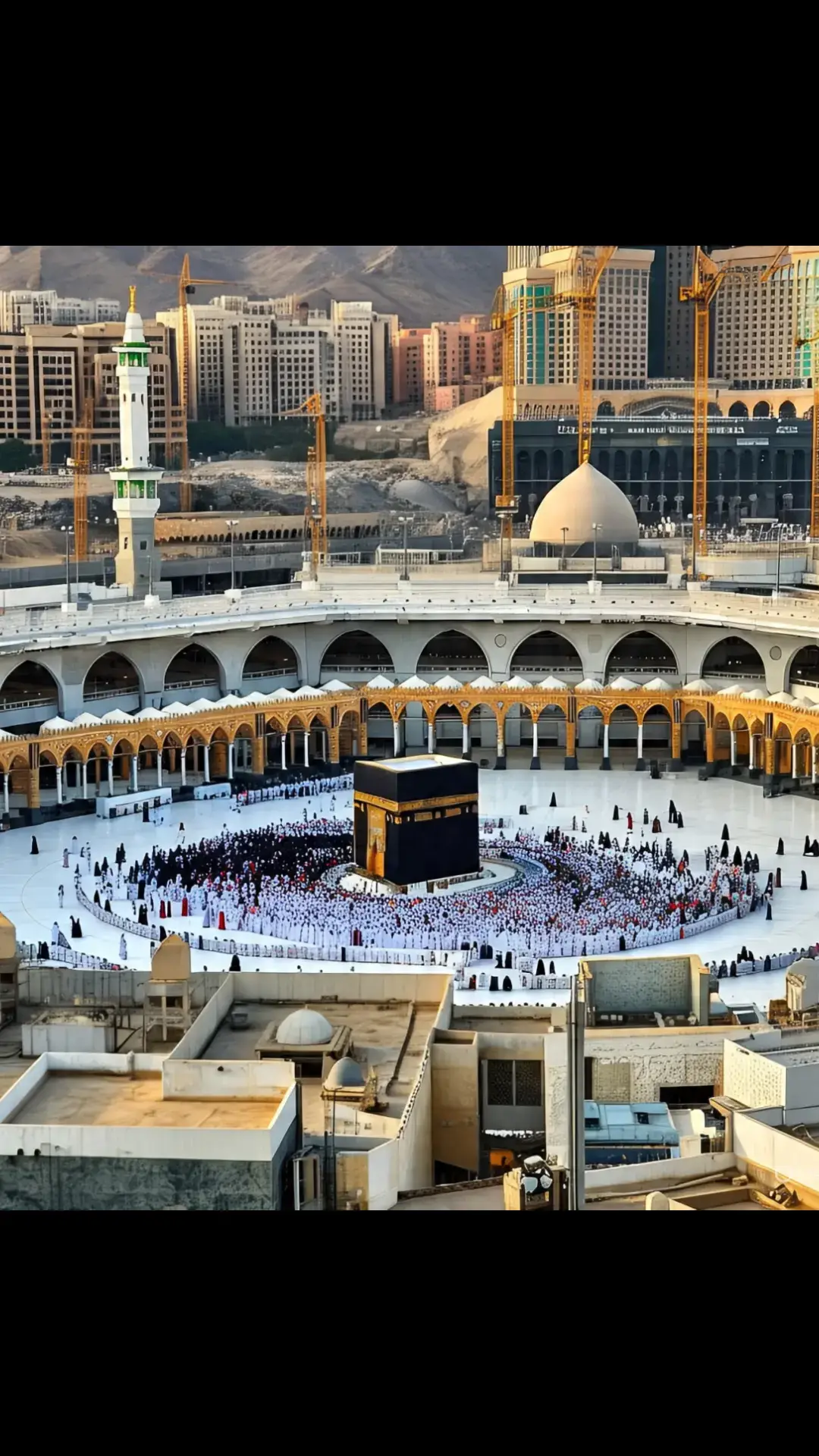 A breathtaking panoramic view of Makkah, capturing the grandeur of the holy city during sunrise, with warm golden light illuminating the majestic architecture of the Grand Mosque, featuring the iconic Cube-shaped Kaaba surrounded by elegantly curved minarets and adorned with intricate Islamic patterns, showcasing the vibrant Islamic calligraphy and geometric patterns on the building's facade, amidst a vast prayer area filled with worshippers from diverse backgrounds, dressed in traditional attire, with the majestic mountain ranges of Jabal al-Noor and Jabal Thur in the background, under a tranquil blue sky with wispy white clouds, with a sense of serenity and spirituality permeating the scene