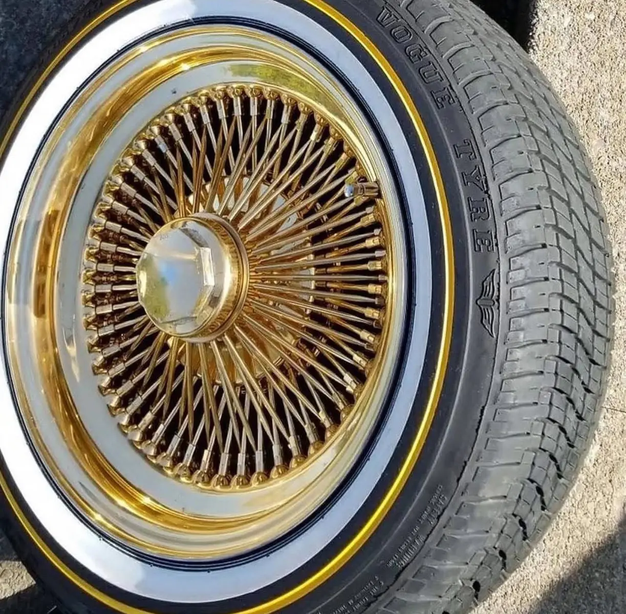 All Gold 100 Spoke Dayton Wire Wheels 15x7 Standard Offset Gold 195/60/15 Vogue Tires 700$!! Will ship!! Dm!! #wirewheels #daytons #daytonwirewheels #wirewheels #chevy #donks4life 