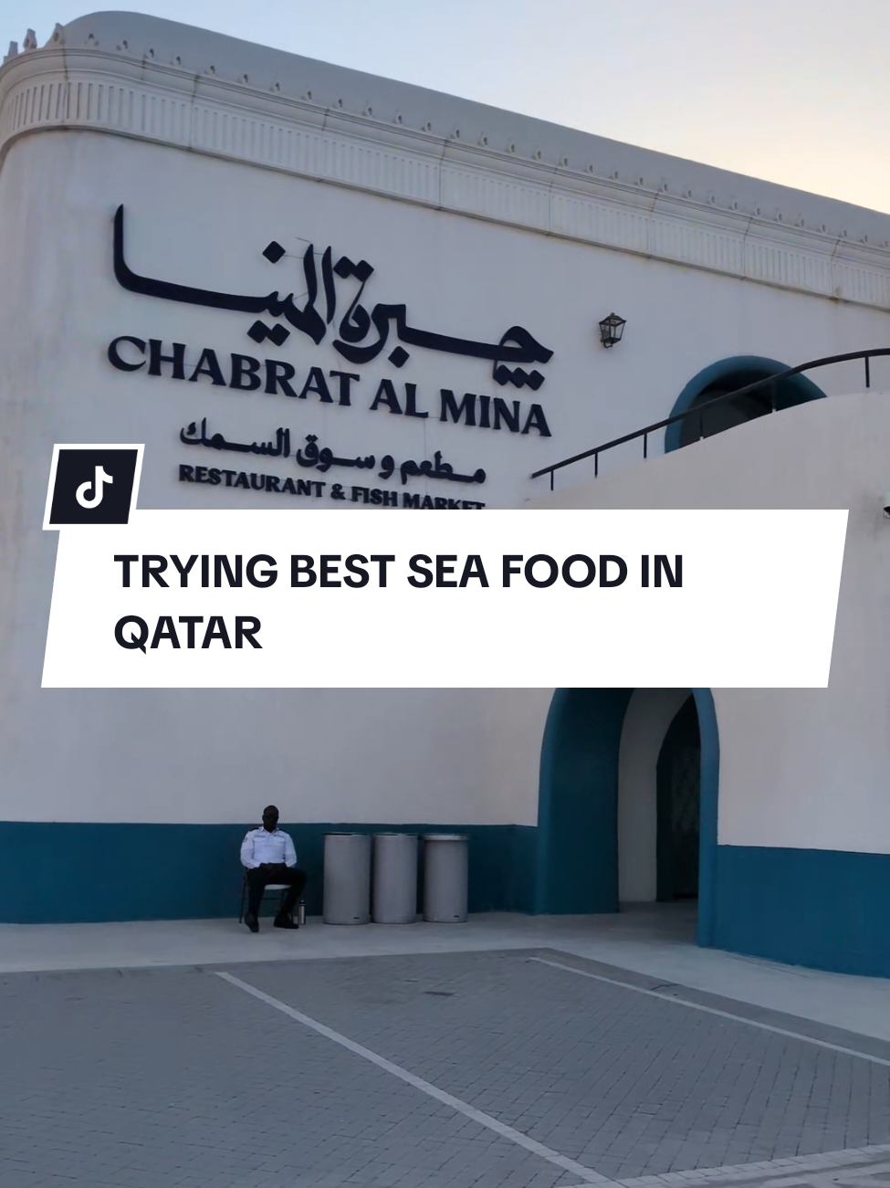 buying the best fish in Qatar freshly cooked in front of you near Mina District 