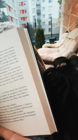 Reading with a dog is so peaceful and especially while raining  #fyp #foryou #like #follow #fypviralシ #maybeviral #viral #dog #shihtzu #book #BookTok #rain #raining #reading #outside #peaceful 