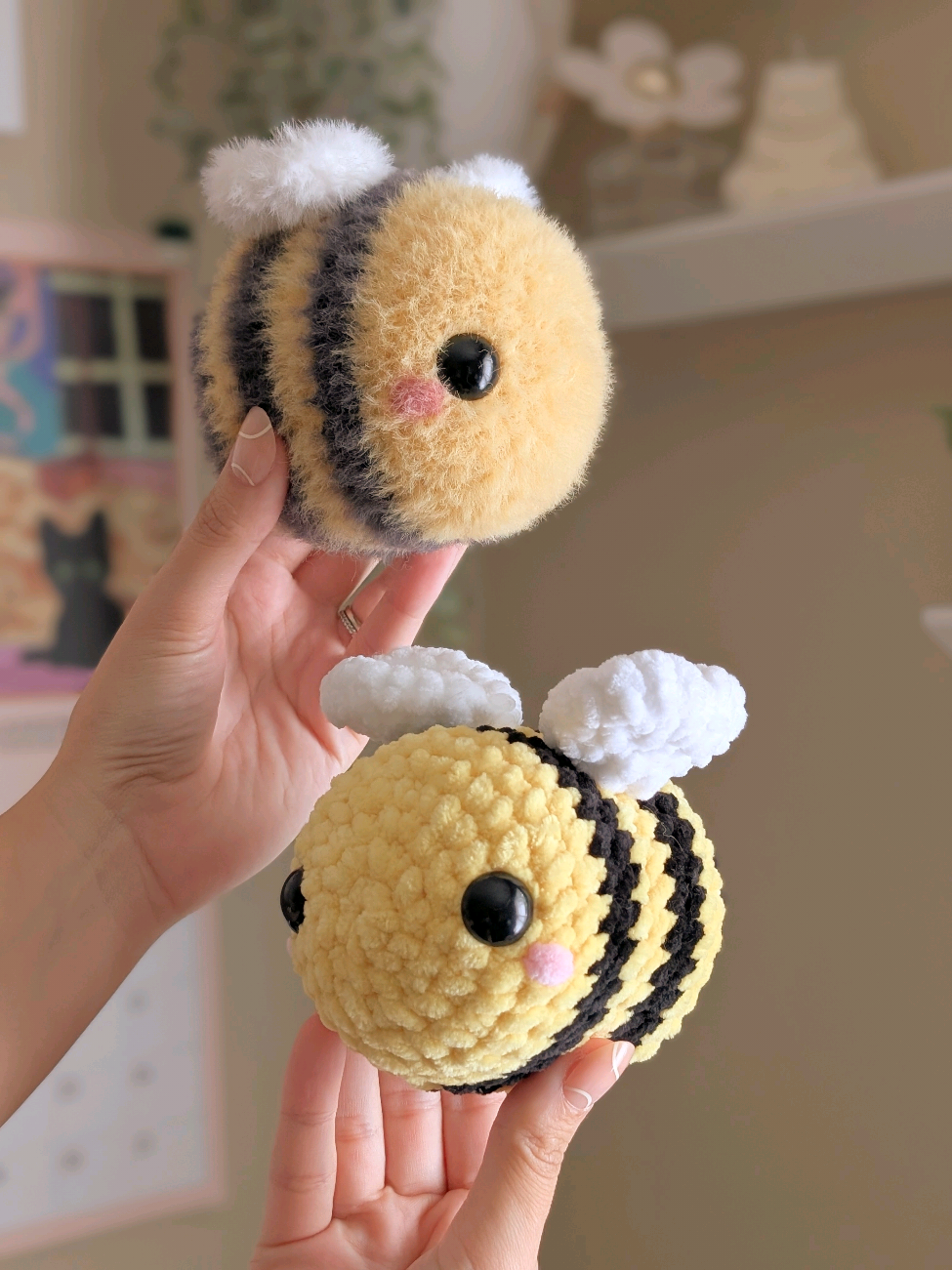 Crochet bees 🐝🫶 Which one do you think is cutest? 🥹💖 PDF pattern available in my Etsy shop, linked in bi0 ❤️ (same pattern for both) Fuzzy bee materials: Feels Like Bliss, 4.5mm hook, 16mm safety eyes  & Chenille bee is made with Premier Parfait Chunky, 5mm hook!  #crochetbee #crochetbees #crochetbumblebee #cutebee #beecrochet #fuzzybee