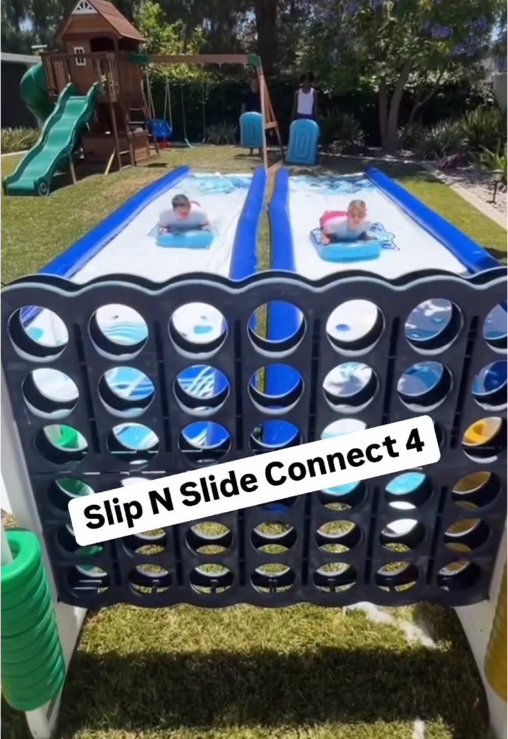SLIP & SLIDE CONNECT 4 It was Dad and Owen vs. Shea and Ella — and let’s just say… things got competitive FAST. 😂 There was sliding, yelling, a dramatic belly flop or two… and one very questionable strategy involving a dive straight into the Connect 4 grid. This game has quickly become one of our absolute favorites — it’s chaotic in the best way, hilarious, and one of those games that gets everyone involved (even the teenagers 🙌🏼). If you’re planning a BBQ, reunion, birthday party, or just want a way to get the kids off their screens and laughing together — you NEED to try this. 👉🏼👉🏼 FOLLOW @globalmunchkins for more family-friendly games, challenges, and ways to make everyday moments way more fun. #familygames #momofteenagers #familyactivities #bigfamilylife
