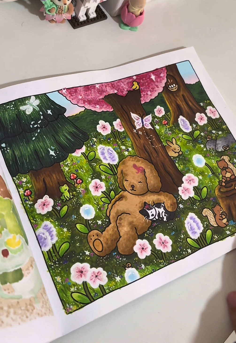 Oii, vem colorir meu melhor desenho comigo!! E o livro de hoje foi Bobbie Goods - Do dia pra noite.  E essa pintura maravilhosa eu fiz inspirada na @𝑎𝑚𝑎𝑛𝑑𝑖𝑛𝑒 🧸🖍️ , eu simplismente sou apaixonada nas paginas dela.  E vocês, o que acharam?? Comentem aqui!! 💗🫶🏼  #bobbiegoods #bobbiegoodscoloringbook #bobbiegoodsart #ohuhu #marcadorestouch #colorindo #ohuhumarkers #coloring 