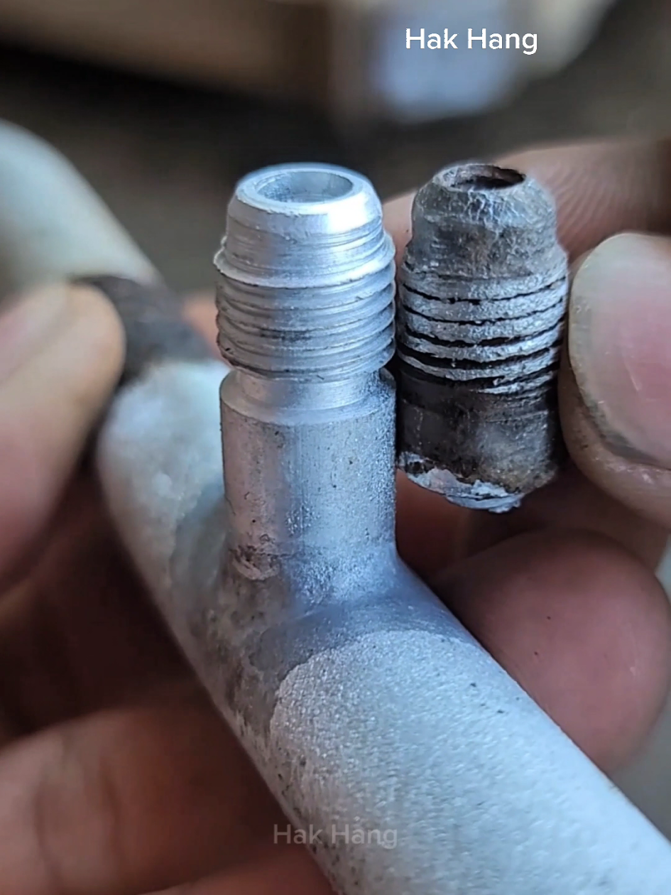 Car air conditioner parts arerecycled & Repairing the copper market of car water tank section & The damaged battery headisrepaired. #Battery #Repair 