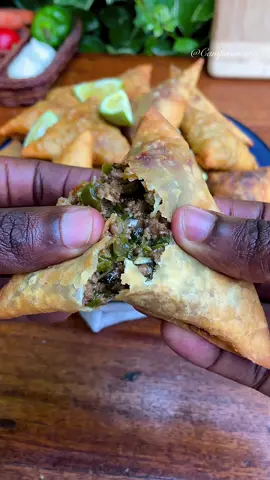 Beef samosas Welcome to yet another episode of my series; Hosting Snacks. Today we’re making these crispy, juicy beef samosas. You’ll need *Samosa sheets ( I used homemade but you can buy) * Leeks * Onions  * Garlic * beef mince (I used minced beef from @Dannykam butchery )  * fresh dhania  -Fry some onions and garlic till fragrant  -Add in your minced beef and fry till browned  -Season your meat, I only use beef cubes and garam masala (if you don’t have garam use a teaspoon each of corriander powder and cumin powder) -Mix well and add in your leeks. I like my filling with a lot of leeks  - Once mixed in turn off the heat, don’t overcook the leeks -Add fresh dhania leaves and set aside to cool completely *Once the meat cools, Grab your samosa sheets and add some filling to it  * Fold as shown in the video *Repeat for the rest of the samosas *Heat some oil up in a pan and fry the samosas on medium high heat until golden  *Serve and enjoy!!!! #hostingsnacks #snackideas #mincebeef #mincedbeef #groundbeef #groundbeefrecipes #mincedmeat #mincedmeatrecipes #samosa #samosas #beefsamosa #sambusa #snacksrecipes #snackrecipes #kenyansnacks