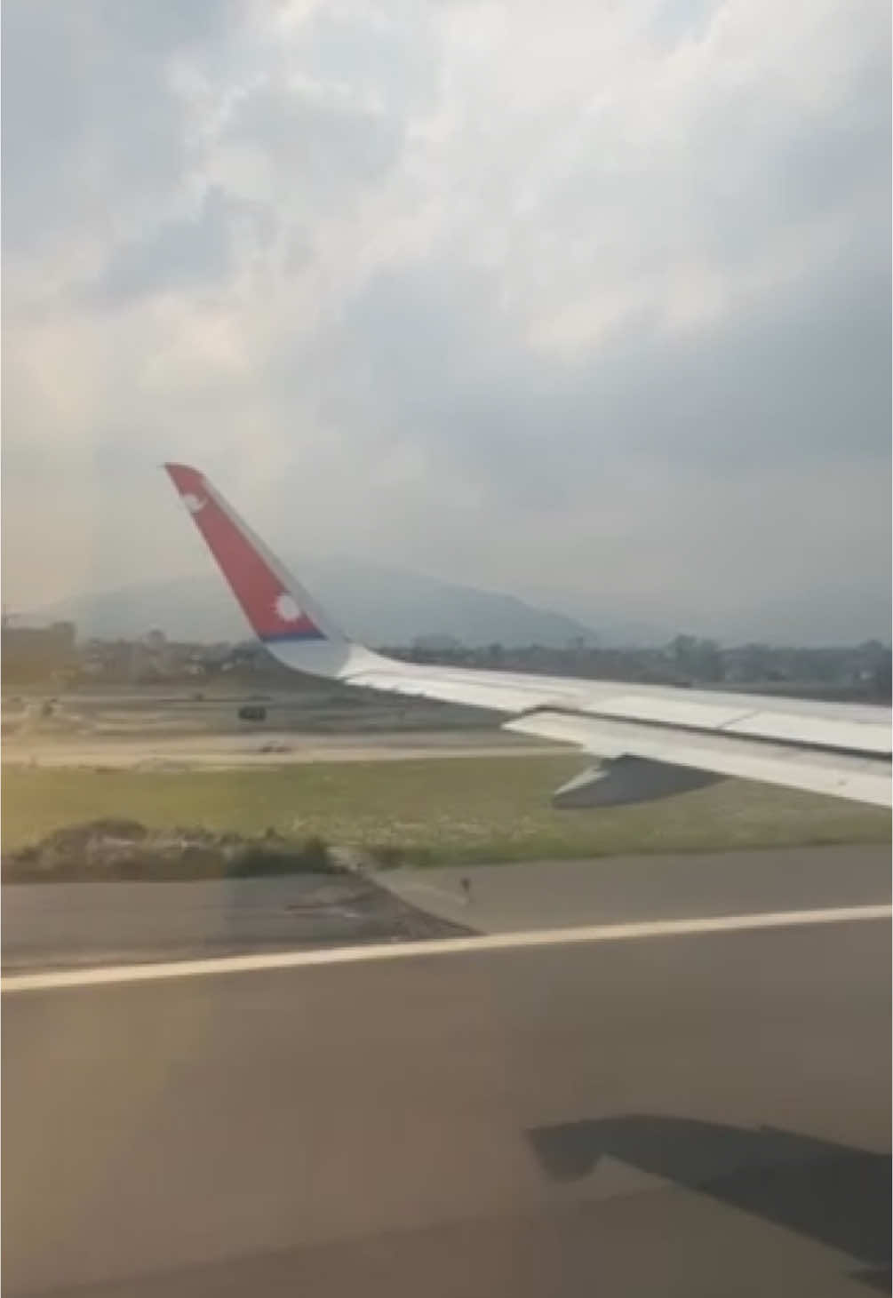 Nepal Airlines taking off from Kathmandu airport Runway 02 toward Bengaluru, India. #plane #nepal #nepalairlines #nepalairlinesa320 #abovetheclouds #wanderlust #planevideo #travel #creatorsearchinsights #kathmanduairport #vnkt #tribhuvanairport 