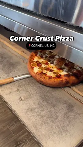 🍕🔥The biggest pizza in town! Corner Crust Pizzeria is serving up GIANT handcrafted slices and pies that are perfect for sharing—or keeping all to yourself. We tried out their newest Cornelius location!  🧀 Corner Crust Pizza exclusively uses Grande Cheese on their pizza and is committed to using only the highest quality ingredients that are made from scratch daily! Customize your perfect pizza using by building your own or order off the menu - they even have a gluten-free crust option! Featured -  🌶️Spicy Italian Pizza Pie  🍕Cup & Char Pepperoni Slice  🥖Garlic Knots  🥗LKN Signature Salad w/ Grilled Chicken Strips 🍤Garden Salad w/ Grilled Shrimp  🍗BBQ & Buffalo Wings  😋Zeppolis  ⭐Sign up for their newsletter + loyalty program and earn 1 point for every dollar spent! You can also get FREE GARLIC KNOTS with any order (only at the Lake Norman location). ⏰Hours:  Mon-Thurs 11am-9pm  Fri & Sat 11am-10pm  Sun 12pm-9pm  📍2 locations:  Cornelius - 21726 Catawba Ave, Ste B-3  Kannapolis - 250 Oak Ave. #CLTGuide #CharlotteNC 