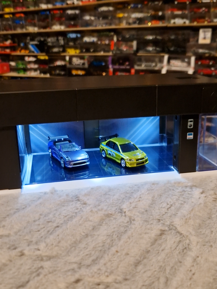 2FAST FOR YA? 🤫 . Check out this BRAND NEW TOMICA PREMIUM GARAGE (black edition) with automatic doors to open anf close! . #modellautosammler #diecastlovers #modellauto #carguy #diecastcollection  #diecast #collectionondisplay #display #hotwheelscollector #fastandfurious #2fast #tomica #tomicaindonesia 