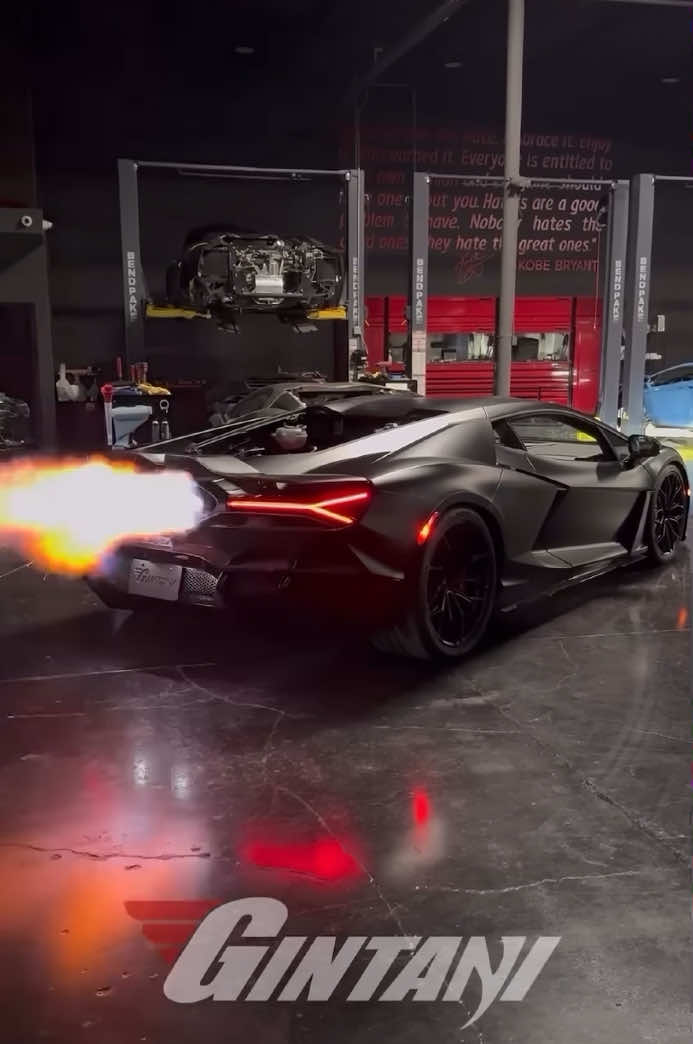 Lamborghini Revuelto. It features a 6.5-liter V12 engine paired with three electric motors, delivering a combined output exceeding 1,000 horsepower. The Revuelto's hybrid system is designed to enhance performance rather than improve efficiency, providing instantaneous acceleration and the iconic V12 sound. This specific Revuelto is tuned by Gintani. #Gintani #Revuelto #Lamborghini