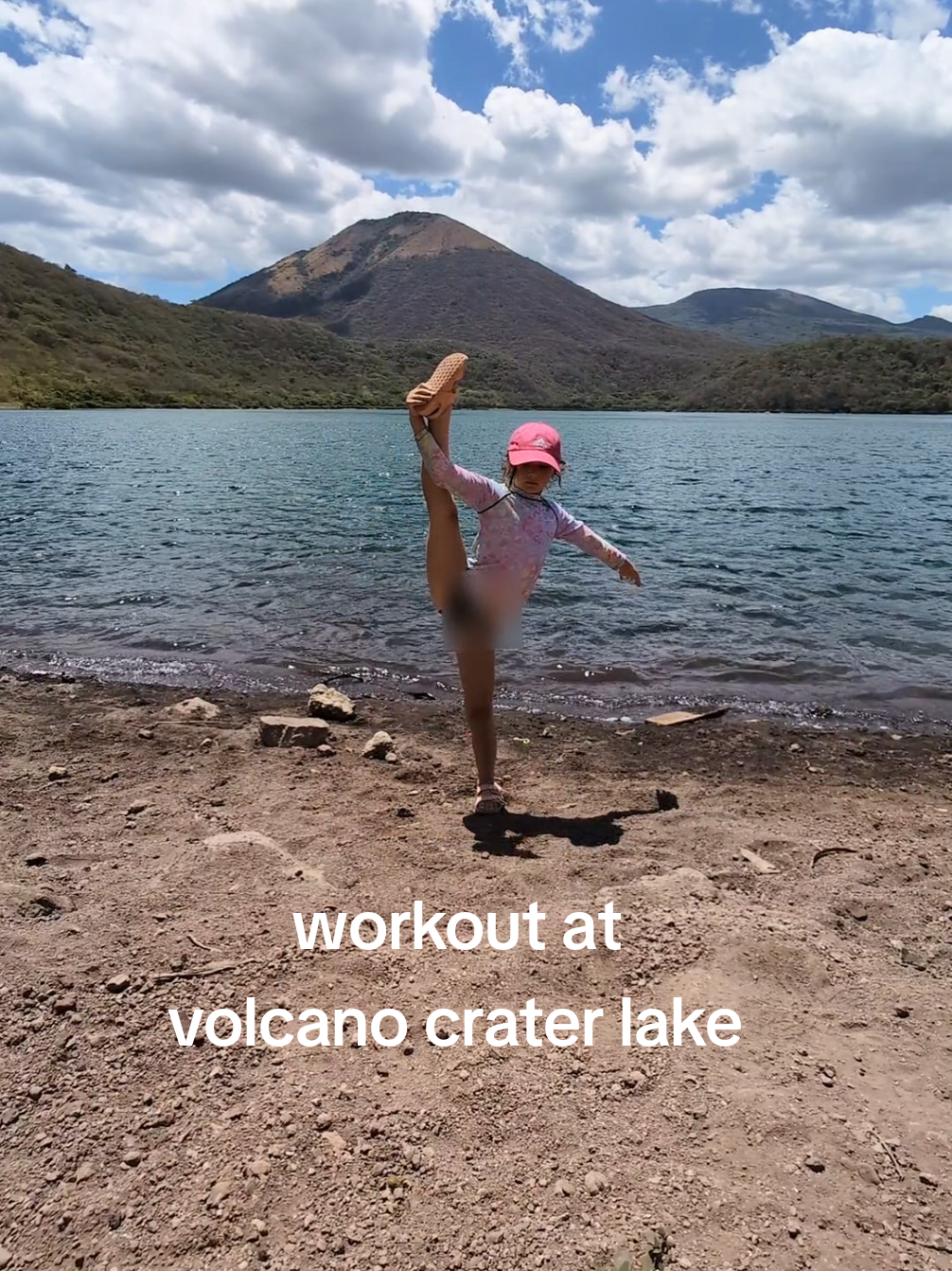 I hope the nudity theme is out of question as this is my bathing suit (long sleeves to protect my shoulders from being sunburned). And this is the lagoon that was formed in a crater of a volcano with a pure fresh water. #volcanolake  #lakelife  #rhythmicgymnastics  #stretching  #volcano  #gymnasticstiktok 