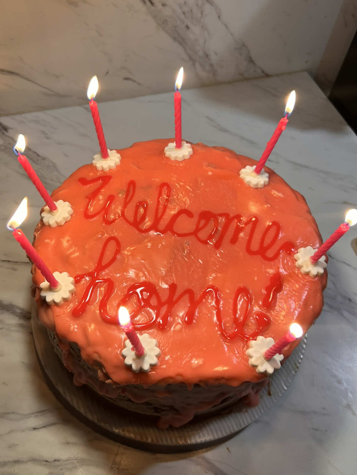 first (and last) time making coralines welcome home cake😀🖤   recipe:   chocolate cake recipe:   (feel free to use a box mix)     2 1/2 cups of sugar (500g) 4 eggs 2 cups of milk(480ml) 1 cup of neutral oil (240g) 4 tsp vanilla extract 3 cups of flour (380g) 2 cups  cocoa powder (160g) 3 tsp baking powder (12g) 3 tsp baking soda (12g) 2 tsp salt(10g) 2 cups HOT water or coffee (480ml)   (this recipe is a huge batch it makes 3 9x2 circular cakes, 5 cups of batter in each)   combine your eggs and sugar until light and fluffy, mix in the rest of your wet ingredients (except for water) until combined. then mix in all of your dry ingredients. after mixing in your dry ingredients add in your hot water/ coffee. (your batter should be thin) seperate into your pans and bake at 350•F for 20-25 minutes. let your cakes cool before you start frosting.    chocolate buttercream:   4 sticks of softened butter(454g) 6 cups powdered sugar (720g)(sifted) 1/4 cup cocoa powder 2-4 tbsp heavy cream 2 tsp vanilla extract 2 tbsp instant coffee   cream your butter until fluffy, then add in your sifted powdered sugar. add in the rest of your ingredients, when your buttercream is finished it should have stiff peaks. (store in fridge until you use)    white chocolate ganache:   6 oz white chocolate 1/4 cup heavy cream (60ml) pink food coloring   warm up your white chocolate until it’s melted (heat up for 10-15 seconds increments if in microwave) then heat up your heavy cream until warm (not hot) mix together until your ganache starts to thicken, once your ganache is finished let cool before adding on the top of the cake (don’t let it cool too much you still want drips)    #coraline #coralinejones #cake #Recipe #baking #bakingrecipe #fyp  