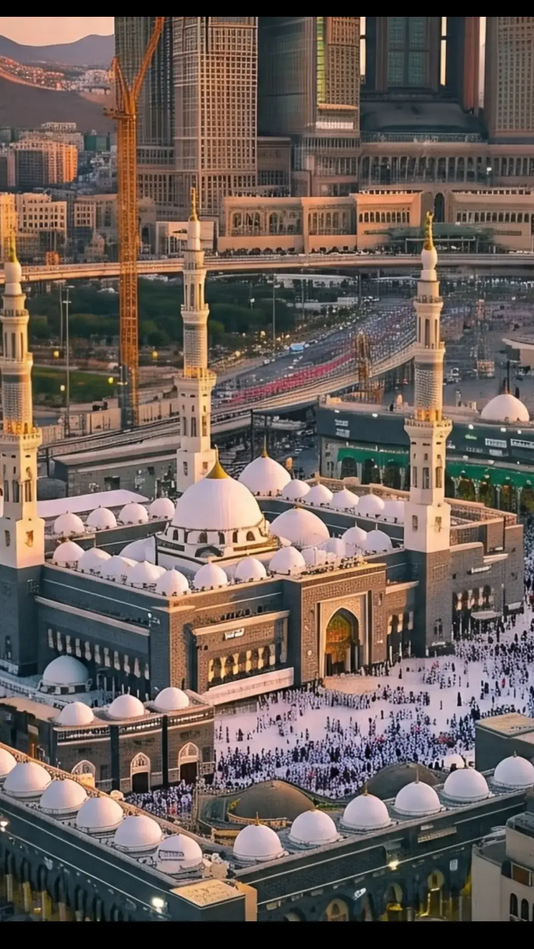 This image captures the majestic beauty of Masjid al-Nabawi, the Prophet's Mosque, located in the holy city of Madina. The iconic green dome marks the resting place of the Prophet Muhammad (PBUH). Surrounded by elegant minarets, the mosque's stunning architecture is illuminated under a clear blue sky. The expansive marble courtyard reflects the soft sunlight, creating a serene and spiritual atmosphere. Pilgrims are seen peacefully walking and praying, symbolizing the unity and devotion of Muslims from around the world. This sacred site is not only an architectural masterpiece but also a place of deep reverence and tranquility. #unfrezzmyaccount  #viral  #trading  #naatstatus  #mashallah  #foryou  #unfreez 