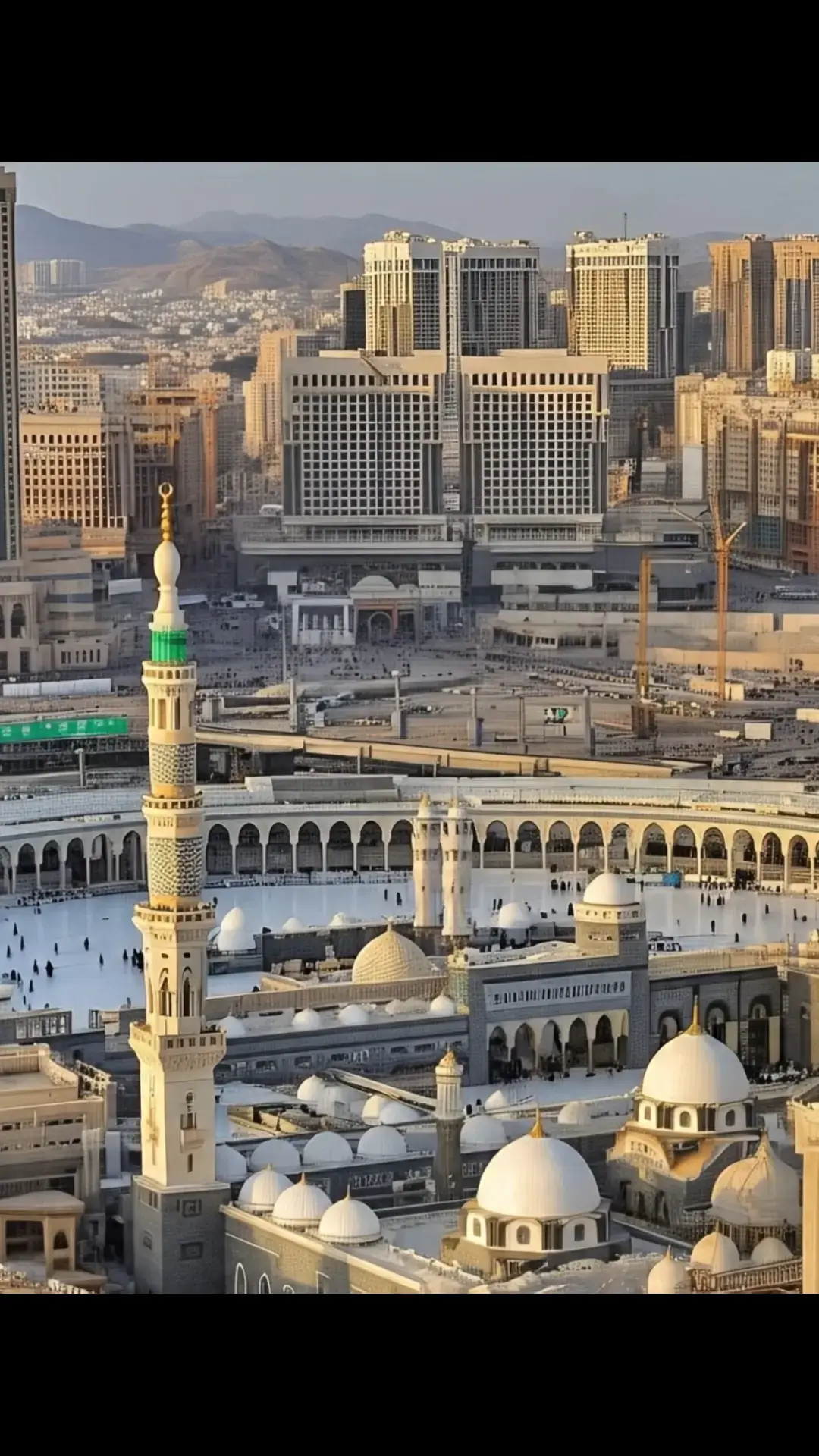 This image captures the majestic beauty of Masjid al-Nabawi, the Prophet's Mosque, located in the holy city of Madina. The iconic green dome marks the resting place of the Prophet Muhammad (PBUH). Surrounded by elegant minarets, the mosque's stunning architecture is illuminated under a clear blue sky. The expansive marble courtyard reflects the soft sunlight, creating a serene and spiritual atmosphere. Pilgrims are seen peacefully walking and praying, symbolizing the unity and devotion of Muslims from around the world. This sacred site is not only an architectural masterpiece but also a place of deep reverence and tranquility. #unfrezzmyaccount  #viral  #trading  #naatstatus  #mashallah  #foryou  #unfreez 