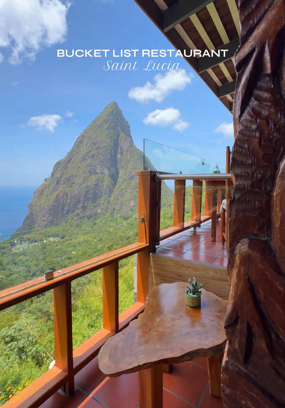 Bucket list restaurant in Saint Lucia 🤩 Lunch with a view and what a view! 😍 ⛰️  Perched above the Pitons at Dasheene Restaurant in Ladera Resort, I enjoyed a fresh farm-to-table lunch filled with local flavors and ingredients. Started with a Mango Delight and the Island Shrimp Caesar Salad, then the Island Grilled Seafood: octopus, calamari, shrimp, fried plantain and bell peppers. For dessert, I tried the Ladera Cacao Mousse and Banana Cheesecake. Everything was delicious. Lunch was prepared by Executive Chef Nigel Mitchel, a proud St. Lucian and James Beard Award winner, who’s been leading Ladera’s kitchen for over 20 years. If you’re visiting St. Lucia, don’t miss it. ✨ 📍Dasheene at Ladera Resort, Rabot Estate, Soufrière, St. Lucia #DasheeneRestaurant #LaderaResort #StLuciaEats #FarmToTable ##FoodieTravel #luxurytravel #SaintLucia Best restaurants in Saint Lucia, Ladera Resort St Lucia, Mejores restaurantes en Saint Lucia