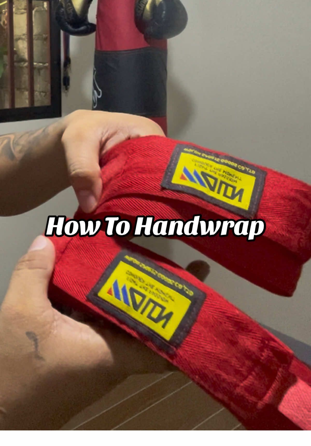 How to Handwrap . #boxingtraining  #shadowboxing  #shadow  #fypage  #punchingbag  #dumbbell  