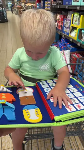 Busy book keeping my busy bee busy while I shop . The perfect gift for children.  #busybook #busybooksforkids #montessorimom #kidstoys #tiktokshop #fypシ #fyp #foryoupage 