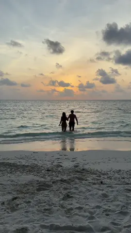 Sunset dip🤍 #sunset #maldives #ocean #couple 