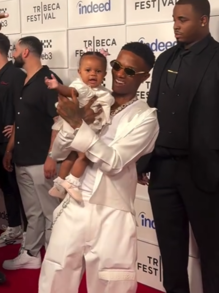 Wizkid introduces his daughter, Morayo, to the world at the Wizkid's 'Long Live Lagos' documentary screening during Tribeca Film Festival in NYC 🇺🇸  📹: @/ooooumou (IG)
