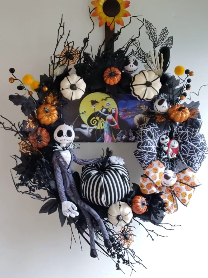 A year one classic that never gets old! #SUMMERWEEN is near!  #nightmarebeforechristmas #halloweendecor #halloweenwreath #halloweentok #spookytok #halloween #halloweenideas #wreathmaker #frontdoordecor #jackskellington #spookyseason #fy #fyp 