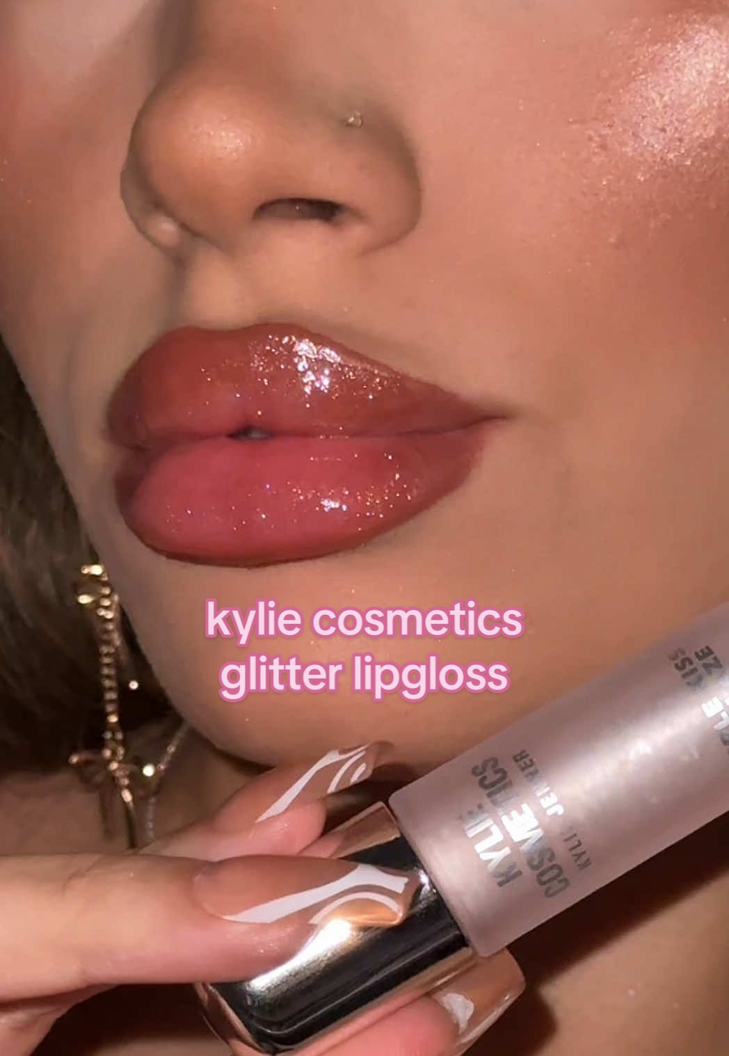 trying kylie jenner’s favourite shimmer lipgloss from her new cosmic 2.0 summer makeup collection and wow.. i’ve fallen in love 🤍  swatching kylie cosmetics supple kiss lip glaze gloss ‘moonstruck’ 🌙✨ @Kylie Cosmetics  #kyliecosmetics #lipswatch #lipcombo #lipglossswatch #glitterlipgloss #glossylips 