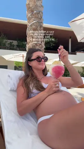 thriving. and this is called making the most of it… thanks hubby🤪🍹💘 #babymoon #pregnantbelly #tanning #summerpregnancy #glasshalffull #silverlining 