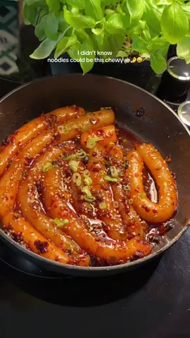 Chili oil noodles 🍜✨  INGREDIENTS:  - 150g potato ( 1 medium potato )  - 75g potato starch  - enough water to form a dough, add 1 tbsp at a time  - 1 green onion  - 2 cloves garlic  - 2 tbsp chili oil  - 2 tsp soy sauce - salt and pepper to your liking  - sesame seeds to garnish ( optional )  #creatorsearchinsights #chilioilnoodles #spicynoodles #cooking #foodtutorial 