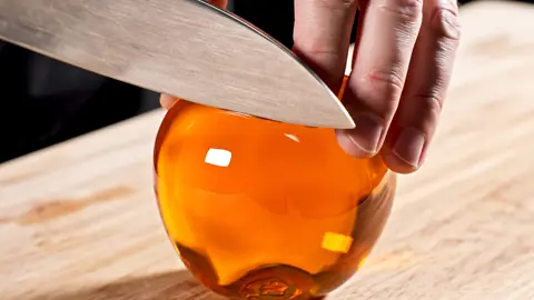 cutting orange glass mass is pure asmr 🔪✨ #glasscutting #orangeglass #satisfying #asmr #glassart #viral #fyp #oddlysatisfying