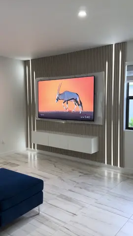 We transformed this space with a modern, custom-designed TV wall 🔥 Built with decorative panels, smart LED lighting, and luxury finishes. 📍 Want something like this in your home? Contact us today. 📞 Free estimates 786-898-4337/ 407-978-0048 | 📍 Hialeah, FL #ModernTVWall #InteriorDesign #HomeRemodeling #TVFeatureWall #LEDLights #CustomDesign #MiamiInteriors #WallPanels #LuxuryLiving #miami #ledlights #interiordesign #ledlighting #wallpanels #tvwalldesign #livingroomdecor #livingroomdesign 